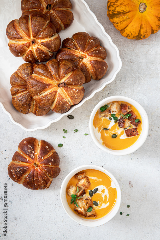 Pumpkin and vegetable puree soup with buns