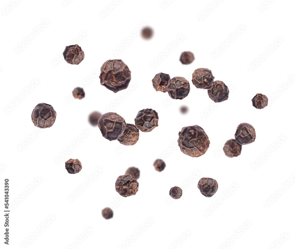 Pepper seeds in a random position in the air on a white background Pepper seeds in a random position in the air on a white background