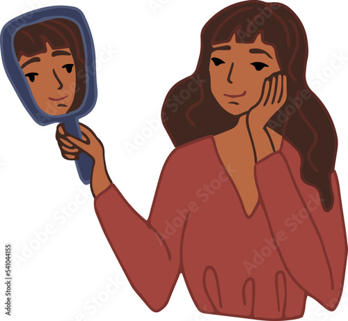 a young girl looks in the mirror, expressing agreement with her appearance. Positive girl admires her face. body positivity