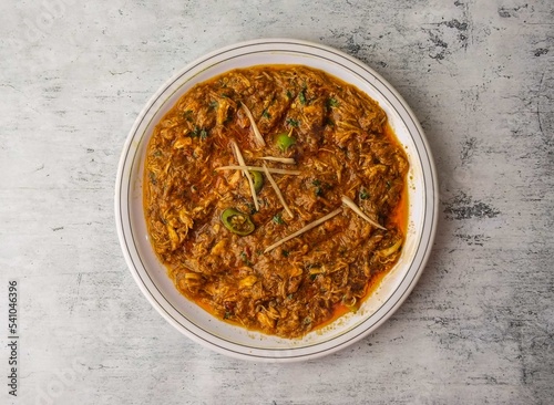 chicken lacha or chicken keema served in a plate isolated on background top view of indian and pakistani desi food photo