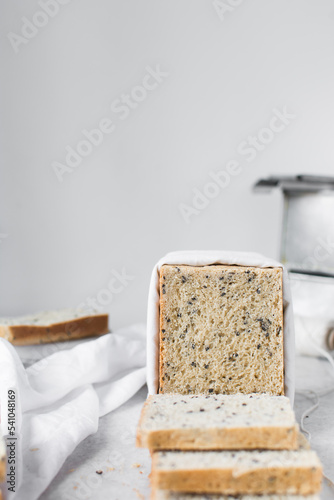 Black sesame seed bread, poppy seed bread, pullmans loaf, sandwich loaf	 photo