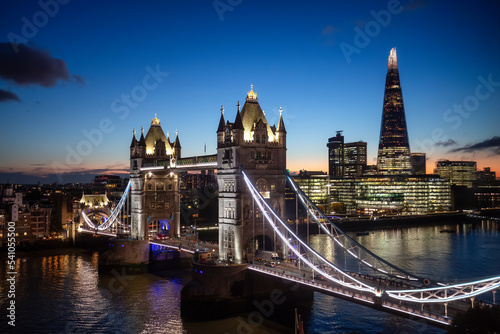 Historic Bridge over River Thames and Cityscape Skyline during dramatic sunset. Tower Bridge in City of London  United Kingdom. Travel Destination.