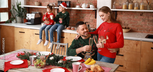 Happy family having Christm...