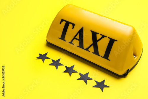 Taxi roof sign and paper st...