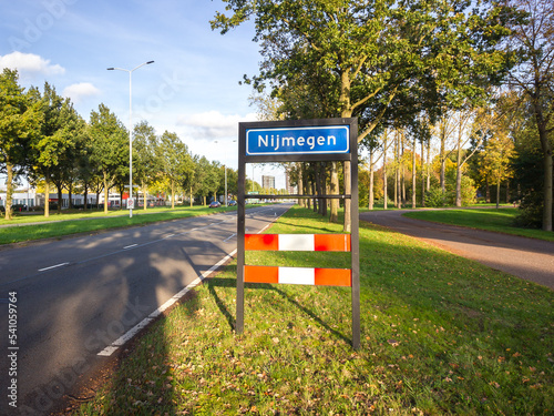 Place name sign for the city of Nijmegen, the Netherlands, on a sunny day in autumn photo