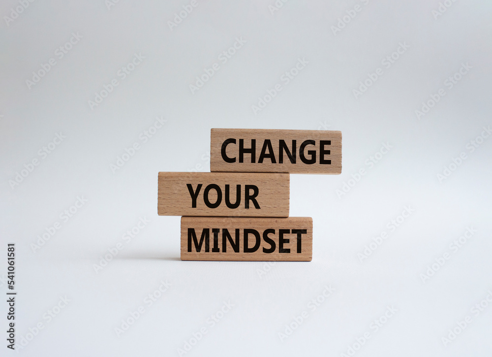 Change your mindset symbol. Concept words Change your mindset on wooden blocks. Beautiful white background. Business and Change your mindset concept. Copy space.