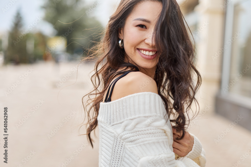 Lifestyle portrait beautiful Asian kazakh woman with brilliant smile Lifestyle portrait beautiful Asian kazakh woman with brilliant smile