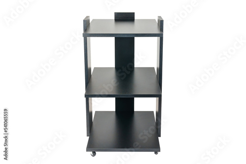 Cabinet or shelving unit on wheels with shelves on a white isolated background. Black chipboard.
