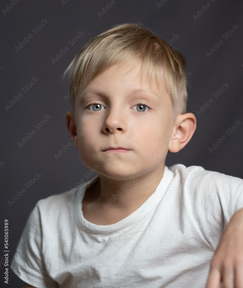 Studio portrait of a blue-eyed blonde caucasian boy Studio portrait of a blue-eyed blonde caucasian boy