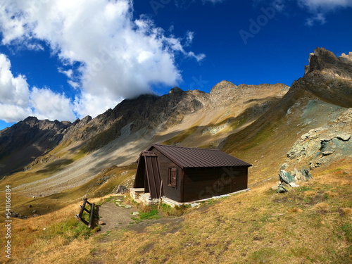 Mountain landscape of long distance hiking trail Tour Des Combins which crosses Switzerland to Italy via Bourg Saint Pierre, Fenetre Durand and Aosta Valley photo