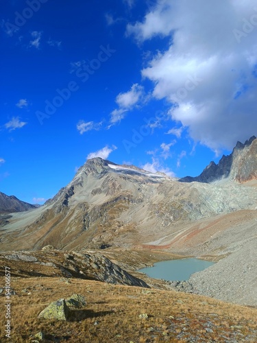 Mountain landscape of long distance hiking trail Tour Des Combins which crosses Switzerland to Italy via Bourg Saint Pierre, Fenetre Durand and Aosta Valley