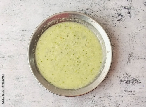 Mint raita served in a plate isolated on background top view of indian and pakistani desi food photo