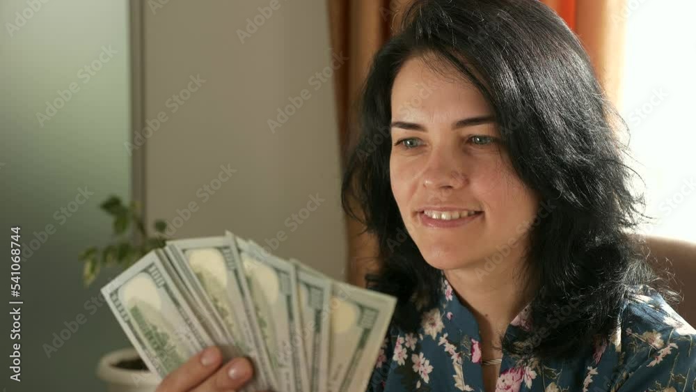 Happy Female Office Worker Manager Counting Money Dollars Cash in Bureau. Successful Business Woman Sit Dreaming at Desk Financial Income Salary. 2x Slow motion 60fps 4K Happy Female Office Worker Manager Counting Money Dollars Cash in Bureau. Successful Business Woman Sit Dreaming at Desk Financial Income Salary. 2x Slow motion 60fps 4K