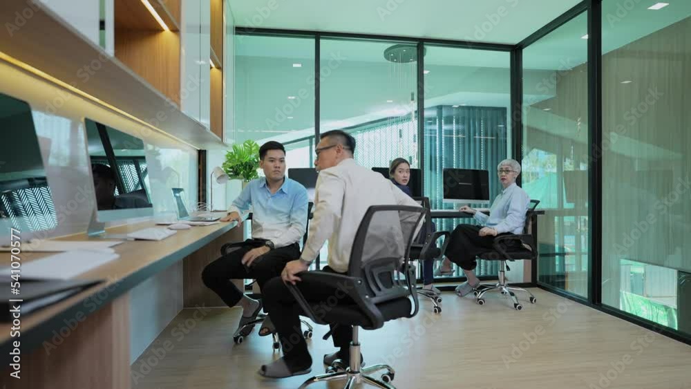 Business concept of 4k Resolution. Employees having fun dancing in the office. congratulations on success.