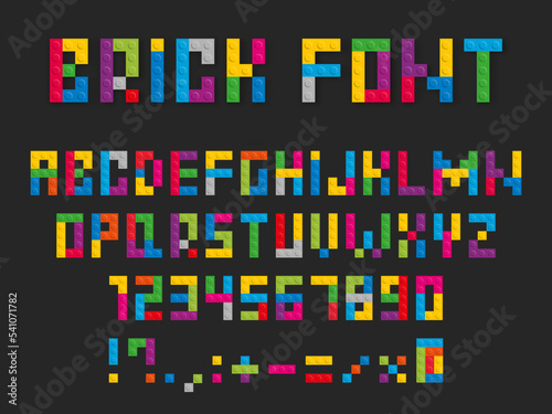 Colored plastic children's building blocks font, children's constructor bricks alphabet letters, numbers and signs.