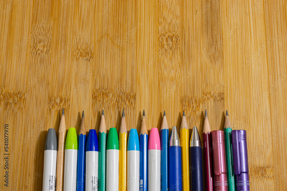 School supplies on wooden background. Back to school concept.. School supplies on wooden background. Back to school concept..