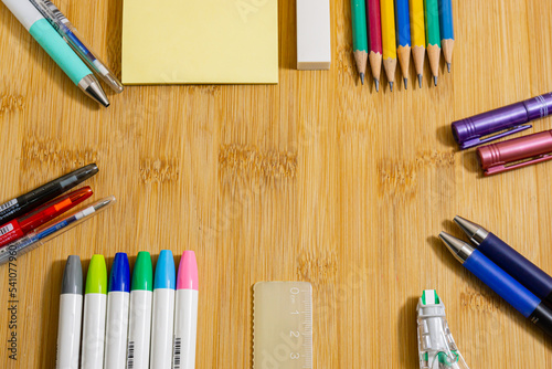 School supplies on wooden background. Back to school concept..