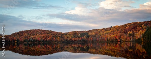 Algonquin Provincial Park, Canada with reflections of autumn trees in a lake