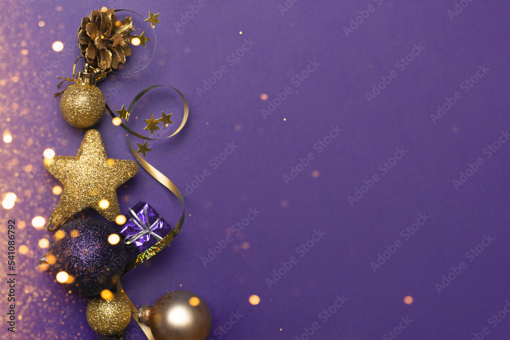 Beautiful gold silver decorations Christmas toys on a dark blue background Beautiful gold silver decorations Christmas toys on a dark blue background