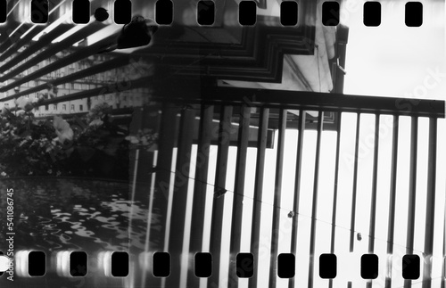 Pinhol photo of town forest on film with multi exposure