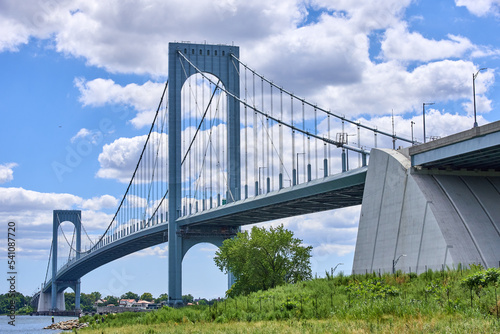 The Bronx–Whitestone Bridge. a suspension bridge, carries traffic over the East River from Bronx to Queens, NYC
