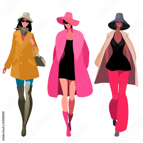 three attractive female models walking the runway, winter collection 2022