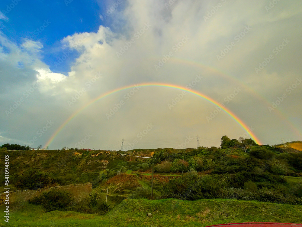 Naklejka premium rainbow over the river