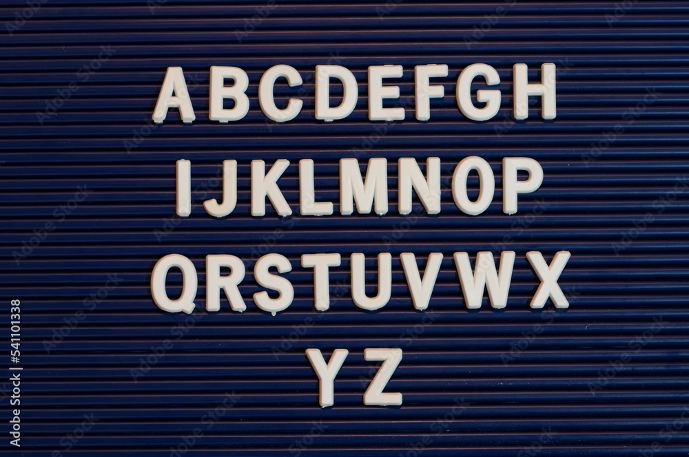 Pushboard sign that with English alphabet in plastic letters Pushboard sign that with English alphabet in plastic letters
