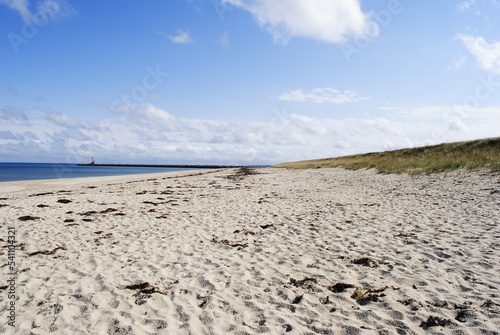 Scusset Beach State Reservation landscape shot of jetty and dunes with an empty beach between them. Sandwich, MA October 2022.