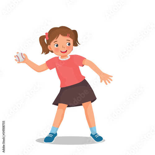 Cute little girl playing throwing a baseball having fun