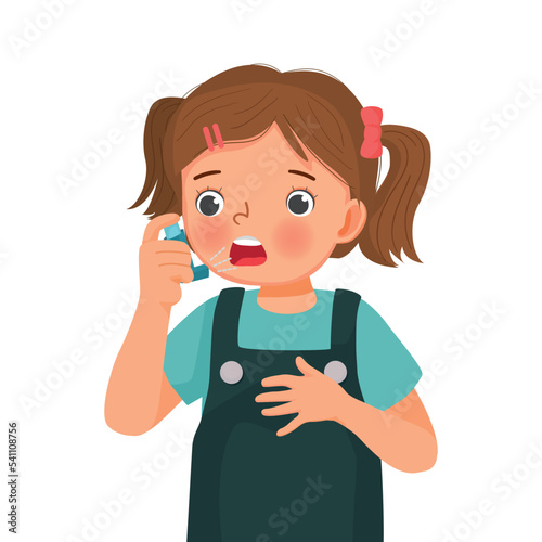 Cute little girl using asthma inhaler nasal spray bottle to treat allergy asthma attack and breathing treatment photo