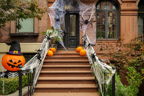 Front of apartment building decorated with spider web for Halloween holiday in Manhattan New York. High-quality photo