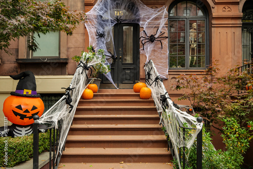 Front of apartment building decorated with spider web for Halloween holiday in Manhattan New York. High-quality photo photo