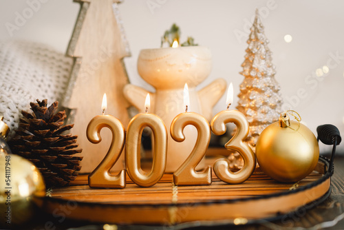 Happy New Years 2023. Christmas background with fir tree, cones and Christmas decorations. Christmas holiday celebration. New Year concept.