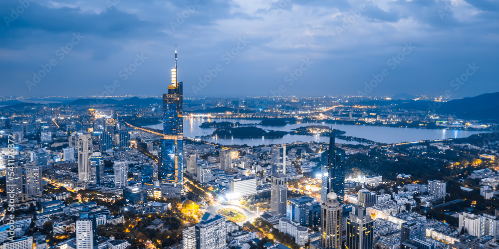 Obraz premium Aerial night view of Zifeng Tower and city skyline in Nanjing, Jiangsu, China