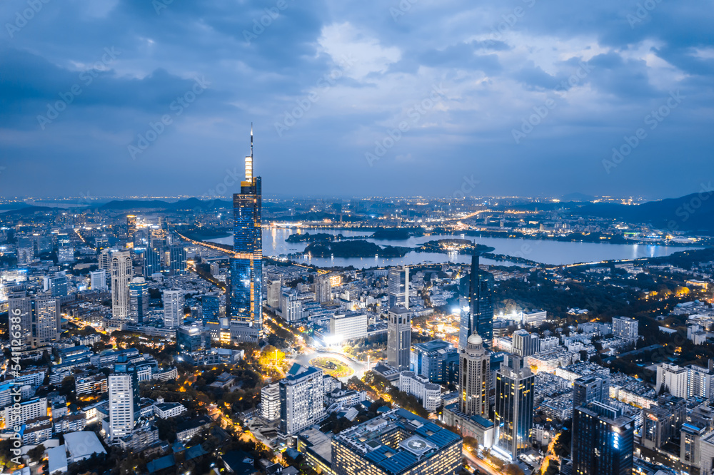 Obraz premium Aerial night view of Zifeng Tower and city skyline in Nanjing, Jiangsu, China