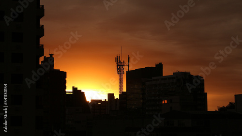 city skyline buildings cityscape at sunset