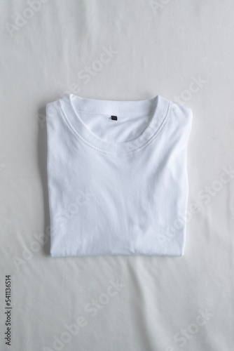 Mockup of top view white blank folded t-shirt template