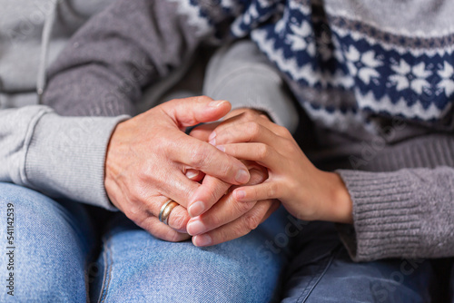 Hands of senior woman and a child, care and support