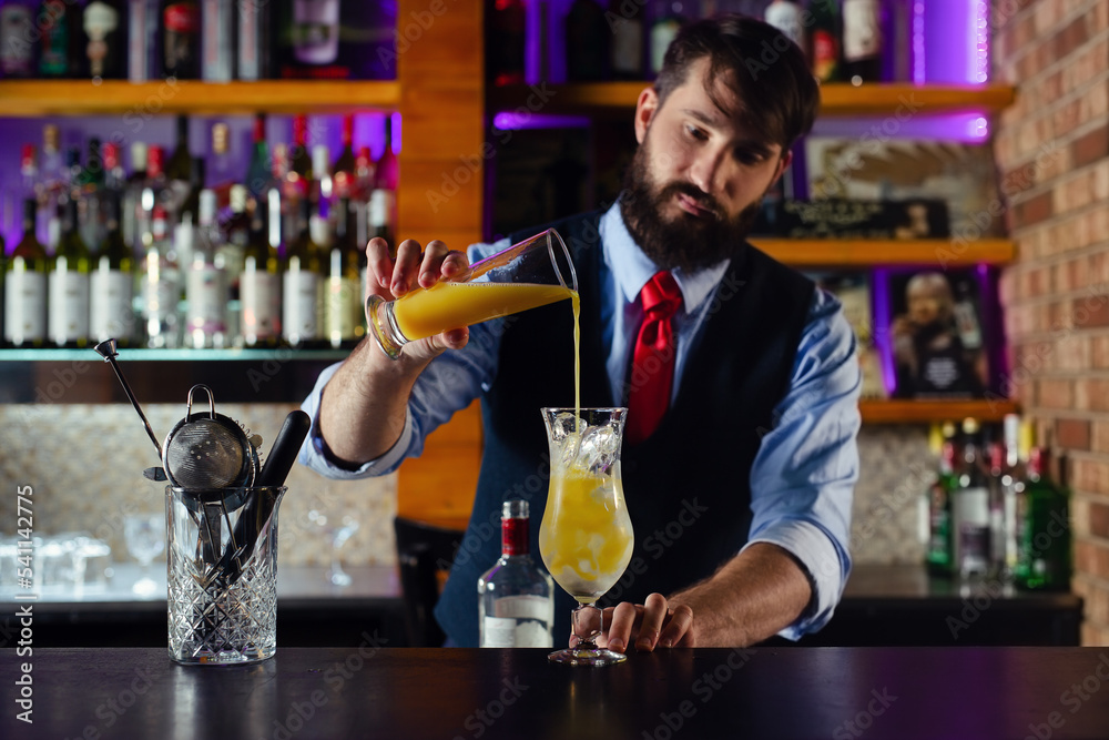 Bartender serve cocktail drink for customer at the bar