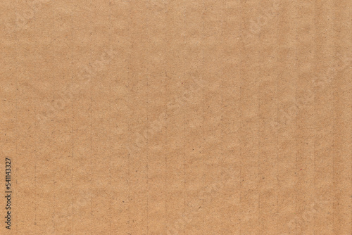 Brown cardboard paper background. Full frame texture.