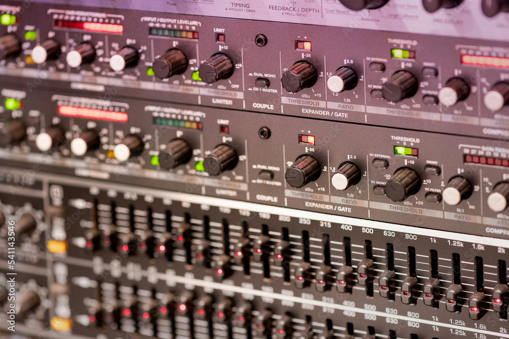 Controls of professional music amplifier StockFoto Adobe Stock