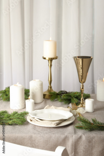 Concept of Happy New Year, Christmas table setting © Atlas