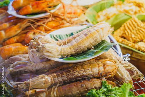 Crayfish in a plate and seafood at Thailand market plaza photo