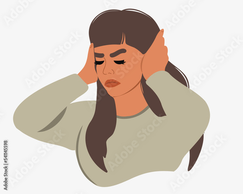 A young woman with anxiety keeps her hands on her head, closes her ears. Stress syndrome, nervous breakdown, despair, anxiety, confusion of thoughts. Mental disorder and chaos in consciousness.
