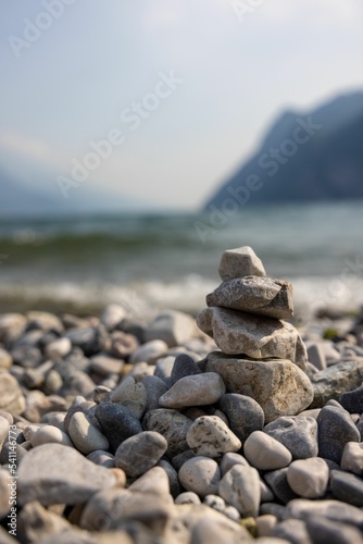 Shallow focus vertical shot of the pepples pile photo