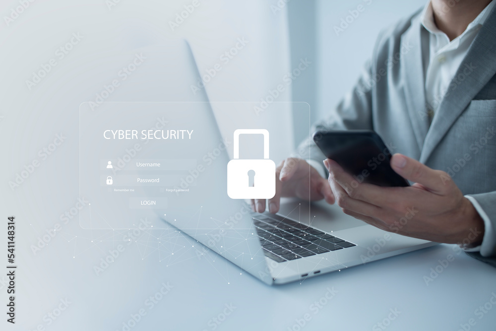 Cybersecurity and data privacy protection concept. And Internet network security technology. Businessman using computer and smartphone. Cybersecurity and data privacy protection concept. And Internet network security technology. Businessman using computer and smartphone.