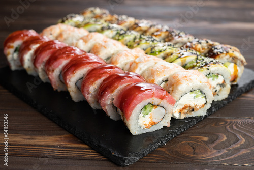 sushi set on the black slate stone, sushi menu, restorant japanese food