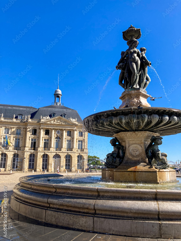 Place de la Bourse in Bordeaux, France. Fountain in the center of the square.