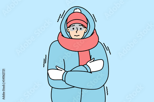 Young man in outerwear feeling cold and freezing outdoors. Unhappy frozen guy in jacket suffer during cold days in winter. Vector illustration. 